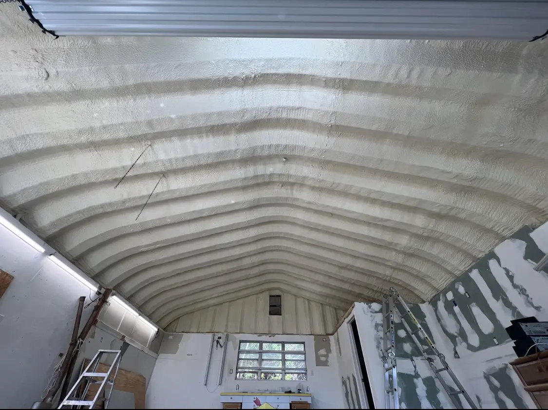 Spray polyurethane foam applied to the underside of a metal roof deck in Allegheny